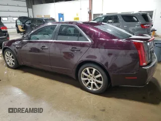 2009 Cadillac CTS AWD z VIN 1G6DT57V990136974, wystawiony jako Copart lot #50154525 z przebiegiem 196 934 mil mil oraz Szkody całkowita. Historia ofert i sprzedaży dostępna na DreamBid. Obrazek 2.