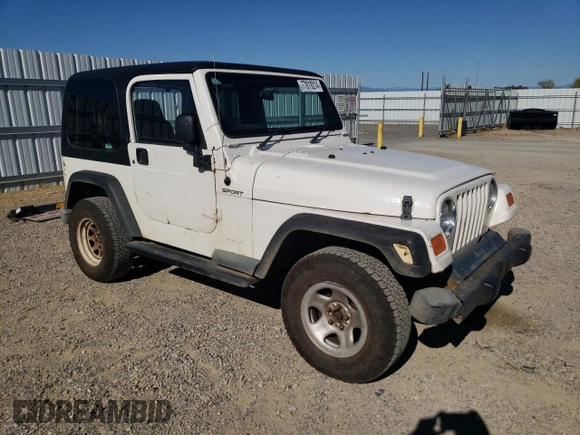 2006 Jeep Wrangler Sport Right Hand Drive with VIN 1J4F449S76P747454, listed as a Copart auction lot 77819214 with 184,763 mi miles and Salvage Title. Bid and sale history available at carsss.com. Image 4.
