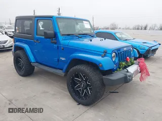 2014 Jeep Wrangler Arctic z VIN 1C4GJWBG3EL313350, wystawiony jako IAAI lot #41442520 z przebiegiem Nie podano mil oraz . Historia ofert i sprzedaży dostępna na DreamBid. Obrazek 1.