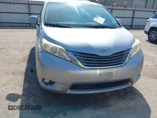 2011 Toyota Sienna XLE AAS with VIN 5TDYK3DC3BS007690, listed as a IAAI auction lot 42044640 with 253,359 mi miles. Bid and sale history available at carsss.com. Image 6.