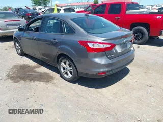 2013 Ford Focus SE z VIN 1FADP3F20DL235001, wystawiony jako IAAI lot #42343368 z przebiegiem 202 356 mil mil oraz . Historia ofert i sprzedaży dostępna na DreamBid. Obrazek 3.