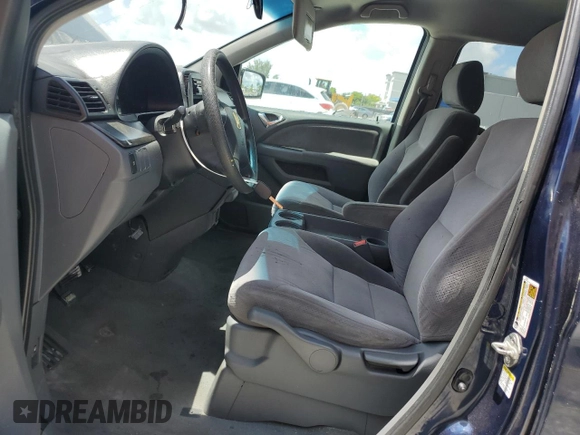 2007 Honda Odyssey LX z VIN 5FNRL382X7B082143, wystawiony jako Copart lot #61271825 z przebiegiem 236 594 mil mil oraz Szkoda całkowita • Salvage title. Historia ofert i sprzedaży dostępna na DreamBid. Obrazek 7.