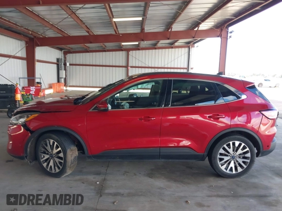 2020 Ford Escape Titanium Hybrid z VIN 1FMCU9DZ1LUC19346, wystawiony jako IAAI lot #41597142 z przebiegiem 75 945 mil mil oraz . Historia ofert i sprzedaży dostępna na DreamBid. Obrazek 14.