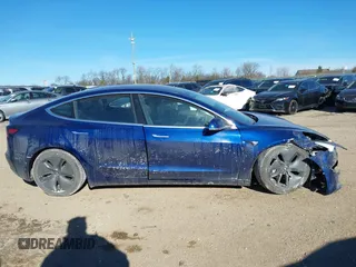 2018 Tesla Model 3 Long Range Battery with VIN 5YJ3E1EA0JF037736, listed as a IAAI auction lot 41423506 with 23,675 mi miles and . Bid and sale history available at DreamBid. Image 12.
