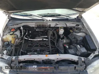 2007 Ford Escape XLS z VIN 1FMYU02Z97KC06172, wystawiony jako Copart lot #56978575 z przebiegiem 155 456 mil mil oraz Szkoda całkowita • Salvage title. Historia ofert i sprzedaży dostępna na DreamBid. Obrazek 12.