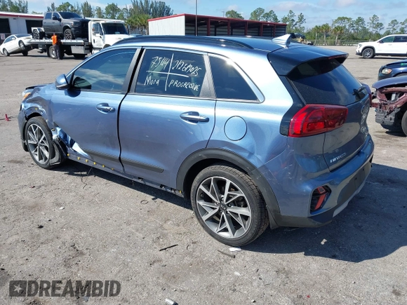 2021 Kia Niro Touring with VIN KNDCC3LC3M5483455, listed as a IAAI auction lot 41678795 with 132,216 mi miles. Bid and sale history available at carsss.com. Image 3.
