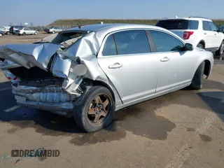 2011 Chevrolet Malibu 1LS with VIN 1G1ZB5E15BF182349, listed as a IAAI auction lot 41456341 with 150,207 mi miles and . Bid and sale history available at DreamBid. Image 4.