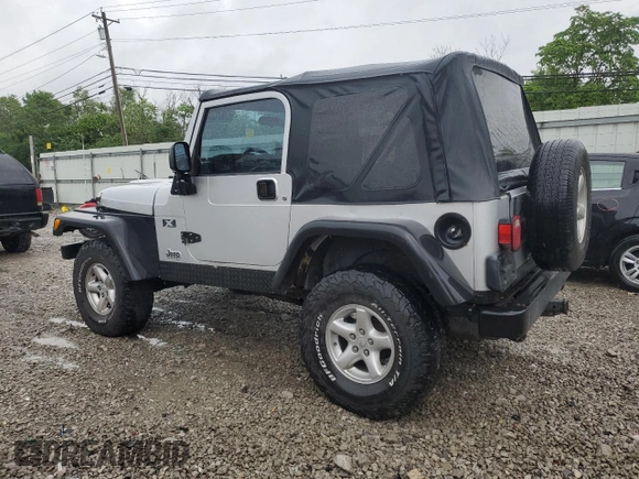 2004 Jeep Wrangler X with VIN 1J4FA39S24P714961, listed as a Copart auction lot 57871235 with 123,164 mi miles and Clean title. Bid and sale history available at DreamBid. Image 2.