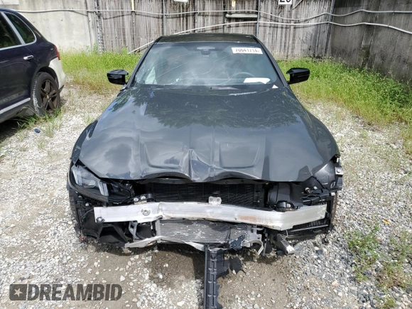 2025 BMW M4 Competition with VIN WBS23HK09SCS65814, listed as a Copart auction lot 70641714 with 2,701 mi miles and Salvage Title. Bid and sale history available at carsss.com. Image 5.