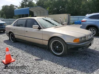 1998 BMW 7 Series 740il with VIN WBAGJ8323WDM24309, listed as a Copart auction lot 65705964 with 206,422 mi miles and Clean Title. Bid and sale history available at carsss.com. Image 4.
