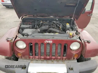 2008 Jeep Wrangler Unlimited Sahara z VIN 1J8GA59108L648333, wystawiony jako Copart lot #57430015 z przebiegiem 506 770 mil mil oraz Czysty tytuł • Clean title. Historia ofert i sprzedaży dostępna na DreamBid. Obrazek 11.