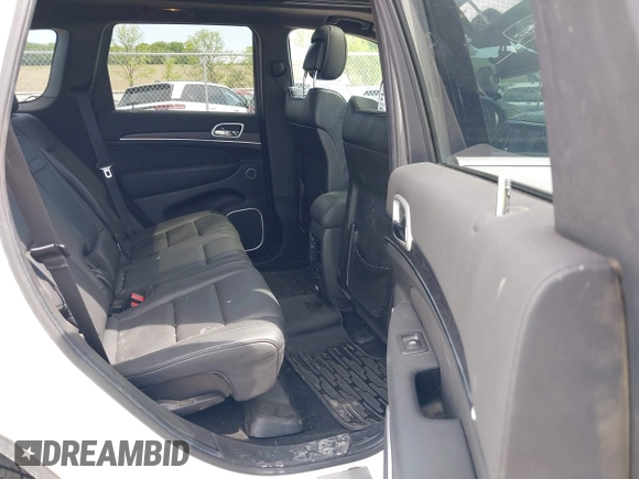2014 Jeep Grand Cherokee Summit with VIN 1C4RJFJG0EC174871, listed as a IAAI auction lot 42341312 with 170,743 mi miles and . Bid and sale history available at DreamBid. Image 8.