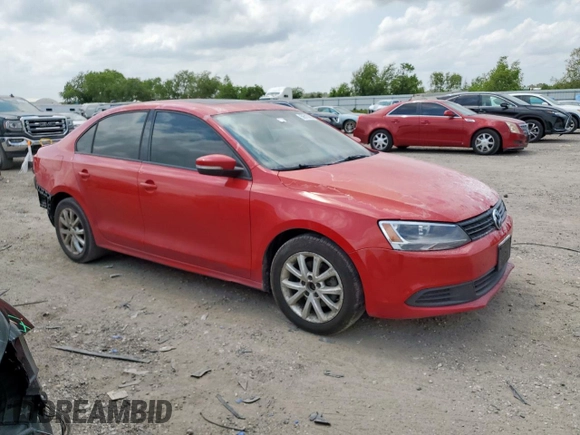 2012 Volkswagen Jetta SE with VIN 3VWDP7AJ8CM385318, listed as a Copart auction lot 56513355 with 193,764 mi miles and Salvage title. Bid and sale history available at DreamBid. Image 4.