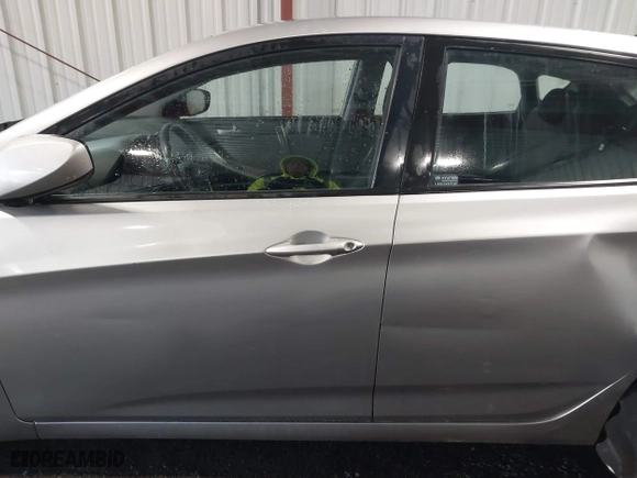 2013 Hyundai Accent GL with VIN KMHCT5AE7DU083867, listed as a IAAI auction lot 41390970 with 160,630 mi miles. Bid and sale history available at carsss.com. Image 14.