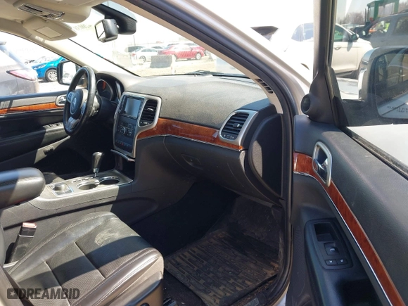 2011 Jeep Grand Cherokee Limited with VIN 1J4RR5GT9BC510322, listed as a IAAI auction lot 42003802 with 211,684 mi miles. Bid and sale history available at carsss.com. Image 5.