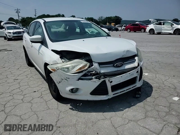2012 Ford Focus SE z VIN 1FAHP3F24CL427067, wystawiony jako Copart lot #60402005 z przebiegiem 141 810 mil mil oraz Czysty tytuł • Clean title. Historia ofert i sprzedaży dostępna na DreamBid. Obrazek 13.