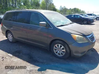 2008 Honda Odyssey EX-L z VIN 5FNRL38768B063991, wystawiony jako IAAI lot #42009031 z przebiegiem 167 524 mil mil oraz . Historia ofert i sprzedaży dostępna na DreamBid. Obrazek 1.
