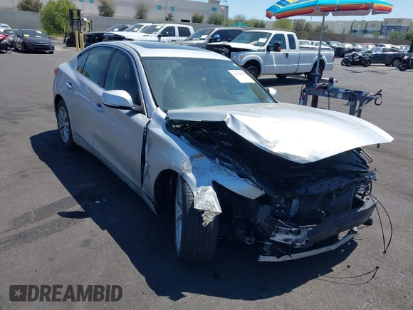 2015 Infiniti Q50 Premium with VIN JN1BV7AP8FM339334, listed as a IAAI auction lot 41956950 with 99,945 mi miles. Bid and sale history available at carsss.com. Image 1.