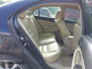 2006 Acura TSX with VIN JH4CL968X6C033437, listed as a IAAI auction lot 42160725 with 168,429 mi miles. Bid and sale history available at carsss.com. Image 8.
