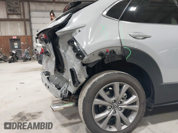 2025 Mazda CX-30 S Premium with VIN 3MVDMBDM5SM788786, listed as a IAAI auction lot 42126428 with 1,370 mi miles and . Bid and sale history available at DreamBid. Image 6.