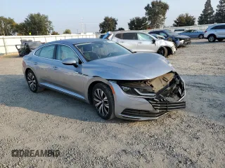 2019 Volkswagen Arteon SE z VIN WVWBR7AN7KE000360, wystawiony jako Copart lot #69217423 z przebiegiem 28 694 mil mil oraz . Historia ofert i sprzedaży dostępna na DreamBid. Obrazek 4.