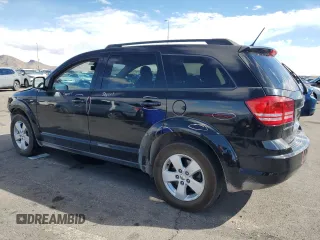 2017 Dodge Journey SE with VIN 3C4PDCAB3HT523810, listed as a Copart auction lot 48036165 with 119,333 mi miles and Salvage Title. Bid and sale history available at DreamBid. Image 2.