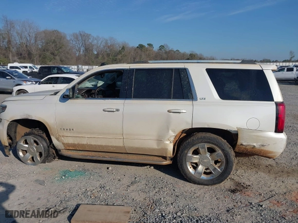 2015 Chevrolet Tahoe LTZ with VIN 1GNSCCKCXFR287609, listed as a IAAI auction lot 41688936 with 112,678 mi miles. Bid and sale history available at carsss.com. Image 15.