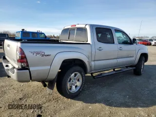 2011 Toyota Tacoma PreRunner with VIN 3TMJU4GN7BM114871, listed as a Copart auction lot 87256214 with 214,236 mi miles and Salvage Title. Bid and sale history available at DreamBid. Image 3.