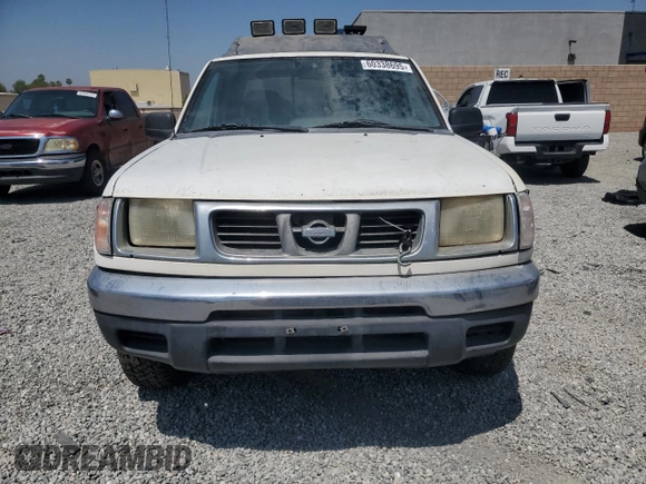 2000 Nissan Frontier XE with VIN 1N6ED27T8YC436513, listed as a Copart auction lot 60338695 with 307,757 mi miles and Clean title. Bid and sale history available at DreamBid. Image 5.