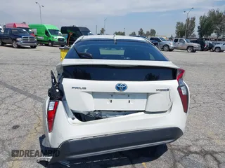 2016 Toyota Prius Four with VIN JTDKARFUXG3511034, listed as a IAAI auction lot 42137394 with 77,424 mi miles. Bid and sale history available at carsss.com. Image 16.