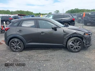 2017 Mazda CX-3 Touring z VIN JM1DKFC79H0162745, wystawiony jako IAAI lot #42318637 z przebiegiem 68 465 mil mil oraz . Historia ofert i sprzedaży dostępna na DreamBid. Obrazek 13.