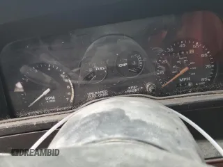 1989 Ford Escort z VIN 1FAPP959XKW361294, wystawiony jako Copart lot #83879674 z przebiegiem 12 406 mil mil oraz Szkody całkowita. Historia ofert i sprzedaży dostępna na DreamBid. Obrazek 9.