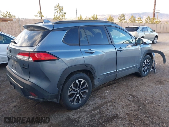 2023 Toyota Corolla Cross Hybrid S with VIN 7MUFBABG3PV005338, listed as a IAAI auction lot 41633311 with 32,082 mi miles and . Bid and sale history available at DreamBid. Image 4.
