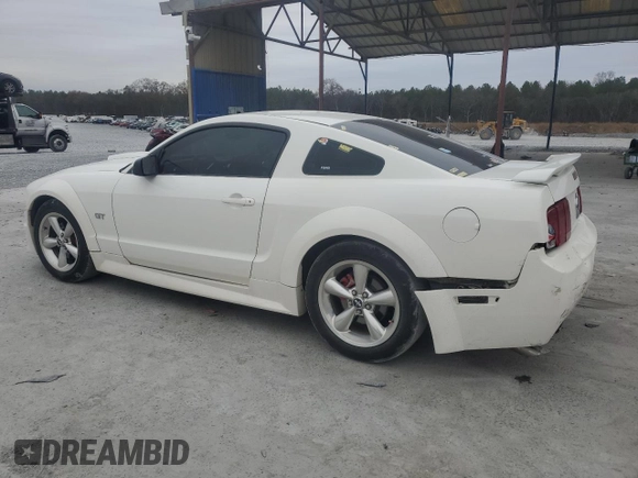 2007 Ford Mustang GT Deluxe with VIN 1ZVHT82H575269780, listed as a Copart auction lot 86815414 with 166,754 mi miles and Salvage Title. Bid and sale history available at carsss.com. Image 2.