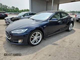 2013 Tesla Model S with VIN 5YJSA1DN6DFP08911, listed as a Copart auction lot 60751295 with Not provided miles and Clean title. Bid and sale history available at DreamBid. Image 1.