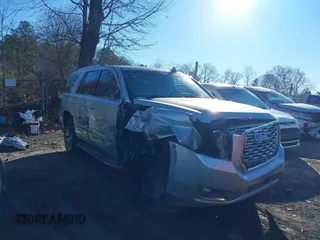 2018 GMC Yukon Denali with VIN 1GKS1CKJ9JR241330, listed as a IAAI auction lot 41180538 with 100,300 mi miles. Bid and sale history available at carsss.com. Image 1.