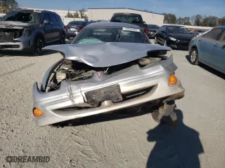 2001 Pontiac Sunfire SE with VIN 1G2JB524817417326, listed as a Copart auction lot 78038904 with 128,860 mi miles and Salvage Title. Bid and sale history available at carsss.com. Image 5.
