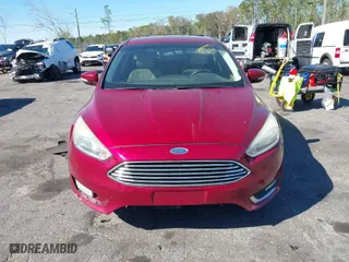 2015 Ford Focus Titanium with VIN 1FADP3N28FL215499, listed as a IAAI auction lot 41839092 with 152,102 mi miles. Bid and sale history available at carsss.com. Image 11.