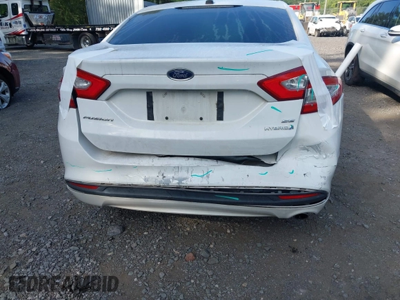 2013 Ford Fusion SE Hybrid with VIN 3FA6P0LUXDR349019, listed as a IAAI auction lot 42800125 with 143,089 mi miles and . Bid and sale history available at DreamBid. Image 6.