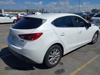 2016 Mazda 3 i Touring with VIN JM1BM1M76G1346083, listed as a IAAI auction lot 41751298 with 87,608 mi miles and . Bid and sale history available at DreamBid. Image 4.