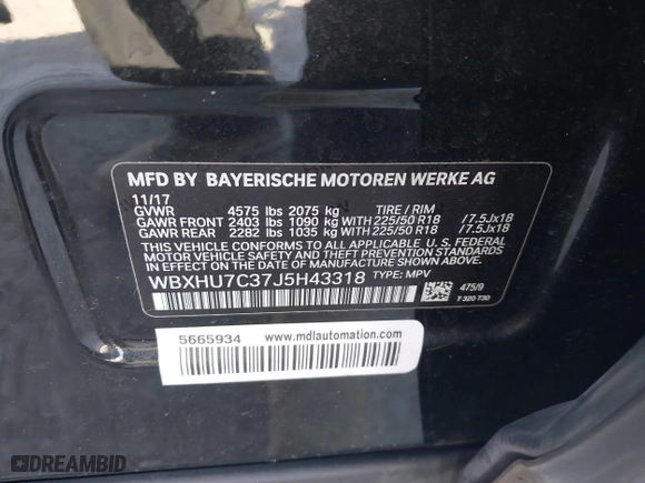 2018 BMW X1 sDrive28i with VIN WBXHU7C37J5H43318, listed as a IAAI auction lot 41294730 with 73,600 mi miles. Bid and sale history available at carsss.com. Image 9.