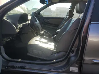 2001 Nissan Maxima SE 20th Anniversary. z VIN JN1CA31A91T314977, wystawiony jako Copart lot #75260034 z przebiegiem 178 471 mil mil oraz Szkoda całkowita • Salvage title. Historia ofert i sprzedaży dostępna na DreamBid. Obrazek 7.