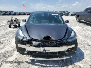2019 Tesla Model 3 Mid Range with VIN 5YJ3E1EA9KF314367, listed as a Copart auction lot 54753605 with 97,913 mi miles and Salvage Title. Bid and sale history available at DreamBid. Image 5.