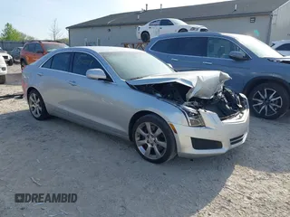 2013 Cadillac ATS Luxury z VIN 1G6AB5RX0D0155670, wystawiony jako IAAI lot #42076118 z przebiegiem 117 084 mil mil oraz . Historia ofert i sprzedaży dostępna na DreamBid. Obrazek 1.