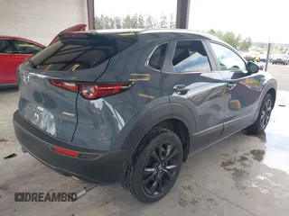 2023 Mazda CX-30 S Carbon Edition with VIN 3MVDMBCM1PM558865, listed as a IAAI auction lot 42298416 with 19,276 mi miles and . Bid and sale history available at DreamBid. Image 4.