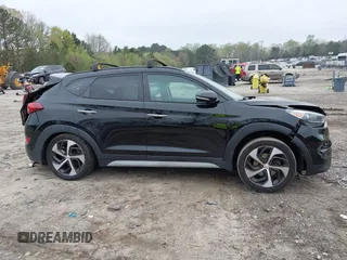 2017 Hyundai Tucson Value z VIN KM8J33A29HU369601, wystawiony jako IAAI lot #41947376 z przebiegiem 140 000 mil mil oraz . Historia ofert i sprzedaży dostępna na DreamBid. Obrazek 14.