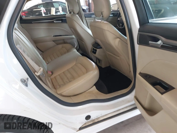 2014 Ford Fusion SE with VIN 3FA6P0HD8ER372731, listed as a IAAI auction lot 39915643 with 136,635 mi miles and . Bid and sale history available at DreamBid. Image 8.