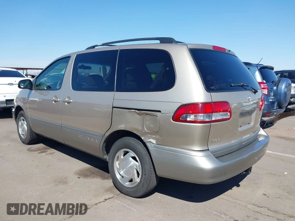2002 Toyota Sienna LE with VIN 4T3ZF13CX2U500604, listed as a IAAI auction lot 41834778 with 139,668 mi miles. Bid and sale history available at carsss.com. Image 3.