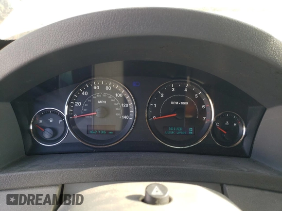 2005 Jeep Grand Cherokee Limited z VIN 1J8HR58N95C719249, wystawiony jako Copart lot #63300195 z przebiegiem 162 736 mil mil oraz Czysty tytuł • Clean title. Historia ofert i sprzedaży dostępna na DreamBid. Obrazek 9.