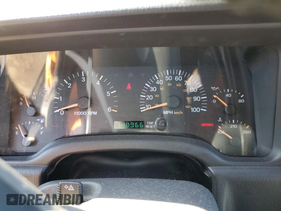 2000 Jeep Cherokee z VIN 1J4FF48S0YL142309, wystawiony jako Copart lot #46277785 z przebiegiem 148 966 mil mil oraz Nie do naprawy • Non repairable. Historia ofert i sprzedaży dostępna na DreamBid. Obrazek 9.